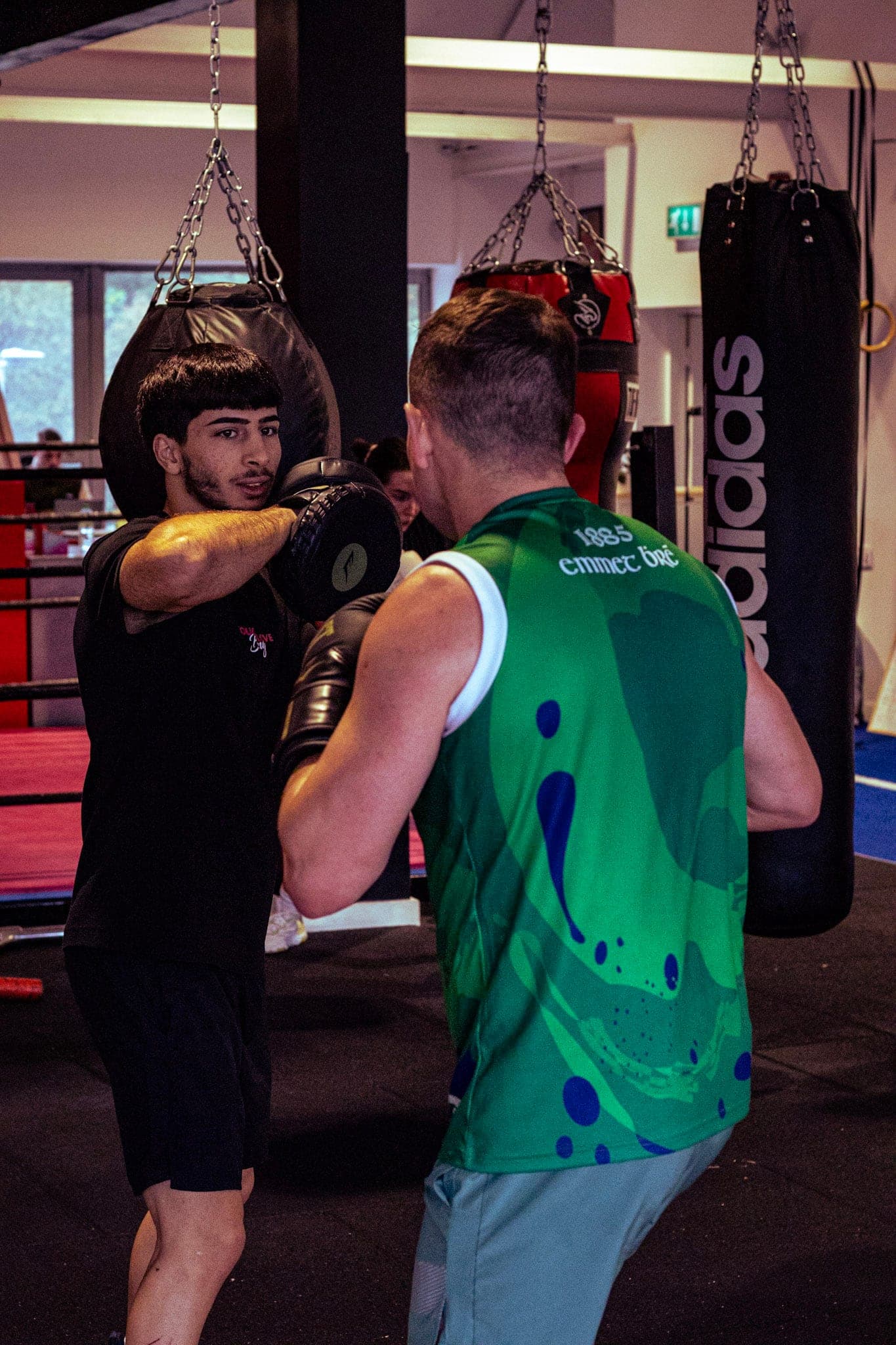 Padwork session beside the heavy bags at Tough Glove