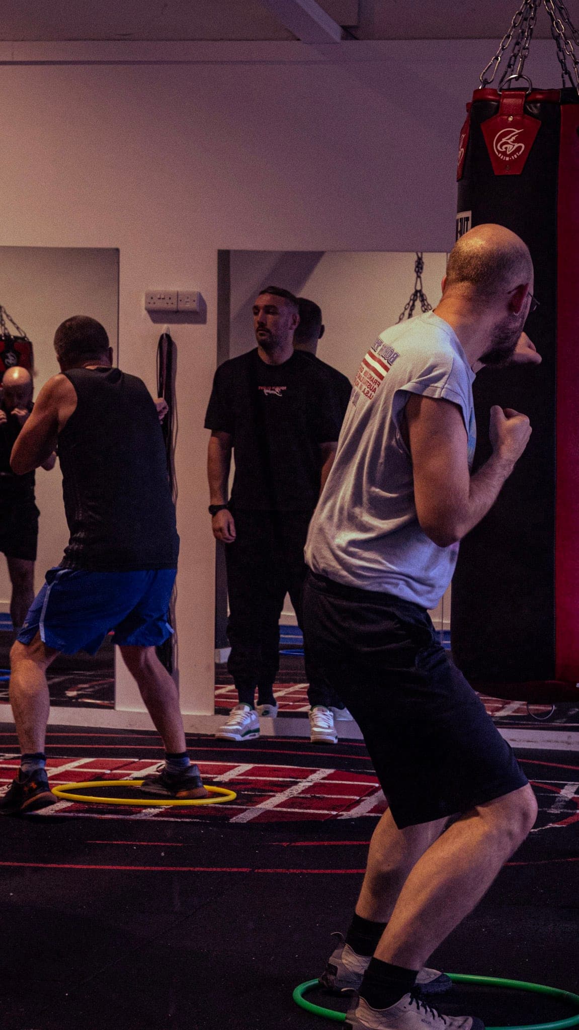 Members working on footwork drills during a class