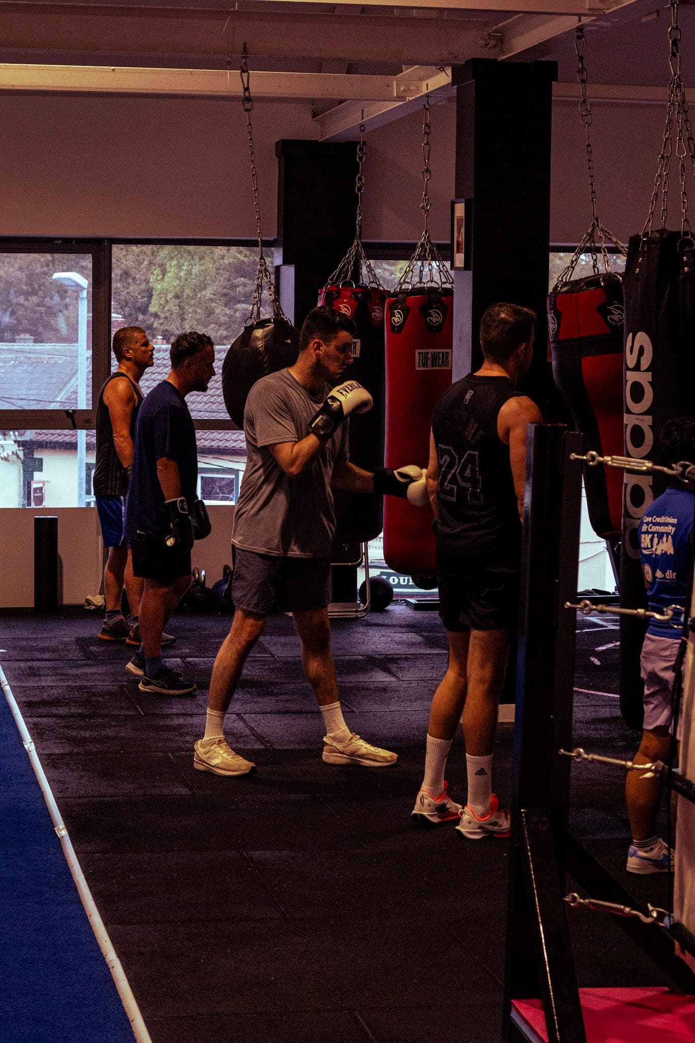A class training around the boxing ring