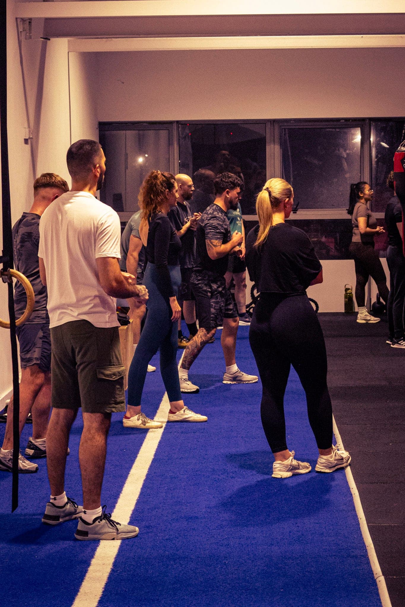 A busy class warming up on the blue track at Tough Glove